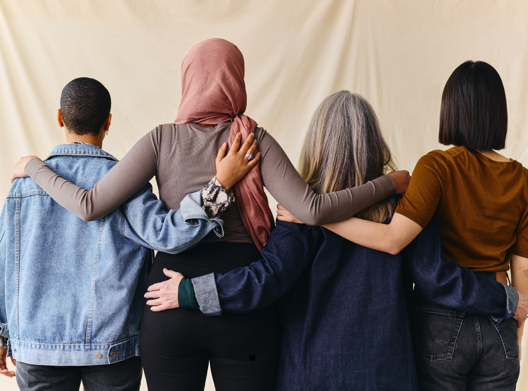 Group of multi-cultural hugging