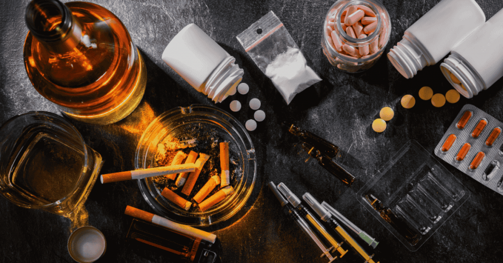 cigarettes drugs all scattered across the table